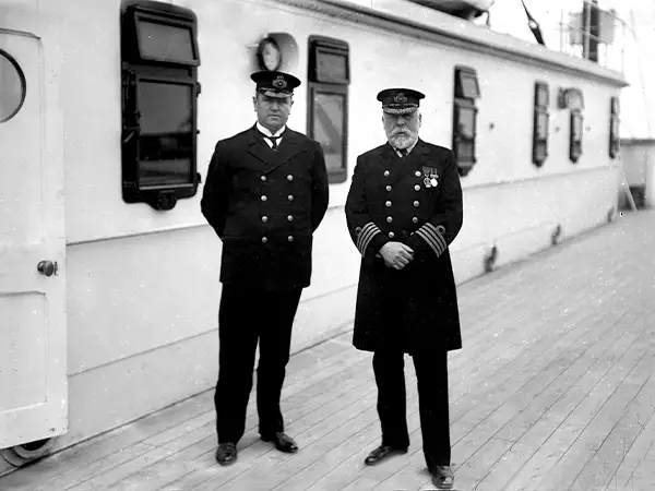 old photo of titanic captain on the deck