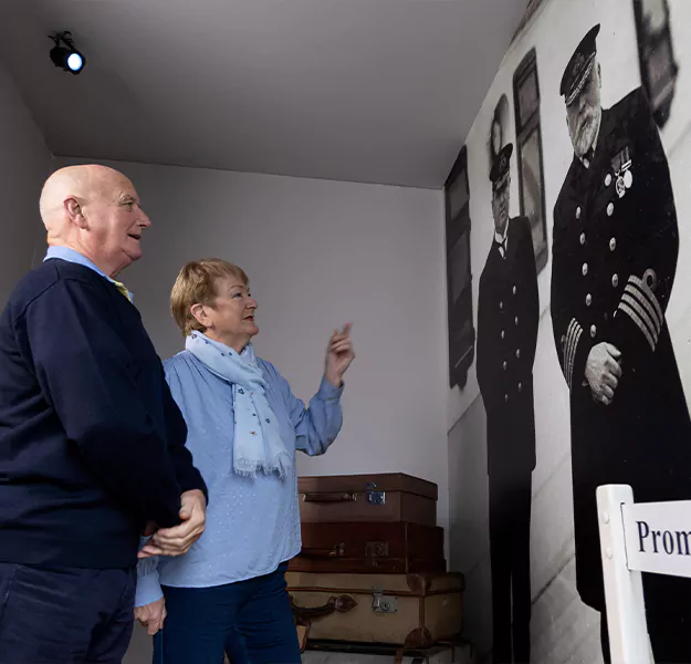 couple admiring captain image